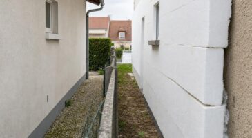 Isolation ext&eacute;rieure et droit de surplomb : cette limite en centim&egrave;tres que votre voisin n&rsquo;a pas le droit de d&eacute;passer sur votre terrain